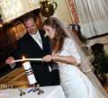 A couple light a Wedding Candle in St Peter's Basilica in the Vatican